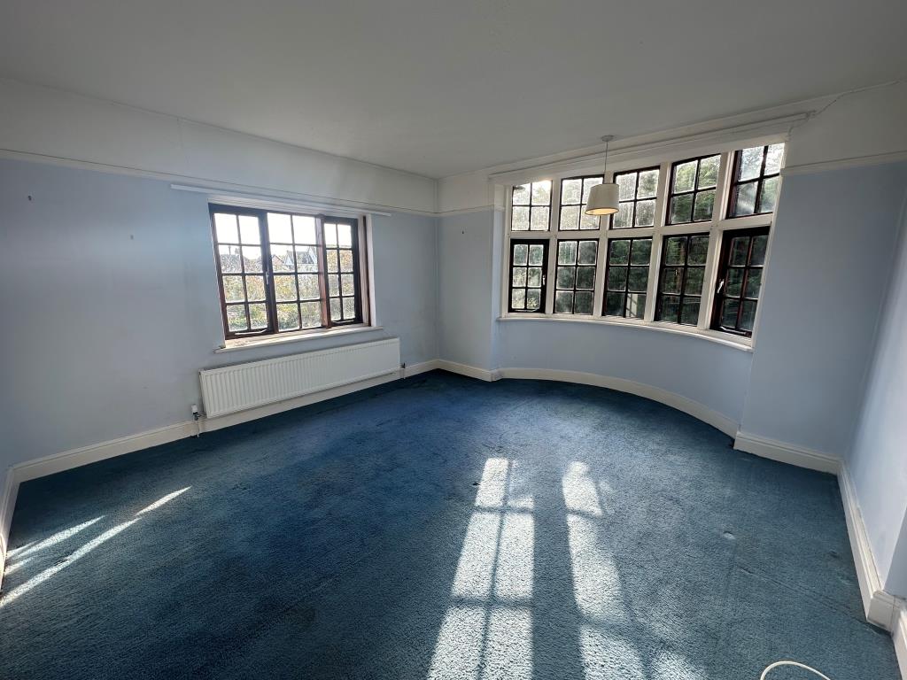 Lot: 129 - FOUR-BEDROOM DETACHED HOUSE FOR REFURBISHMENT - Bedroom one with bay window